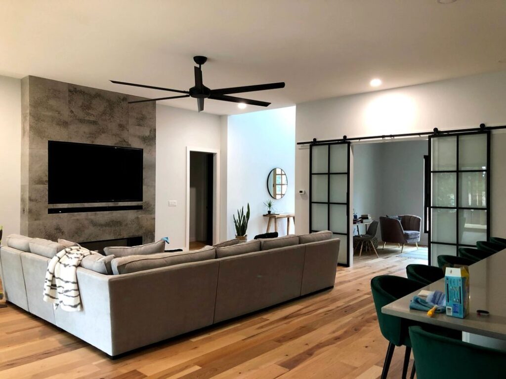 modern living room with huge ceiling fan