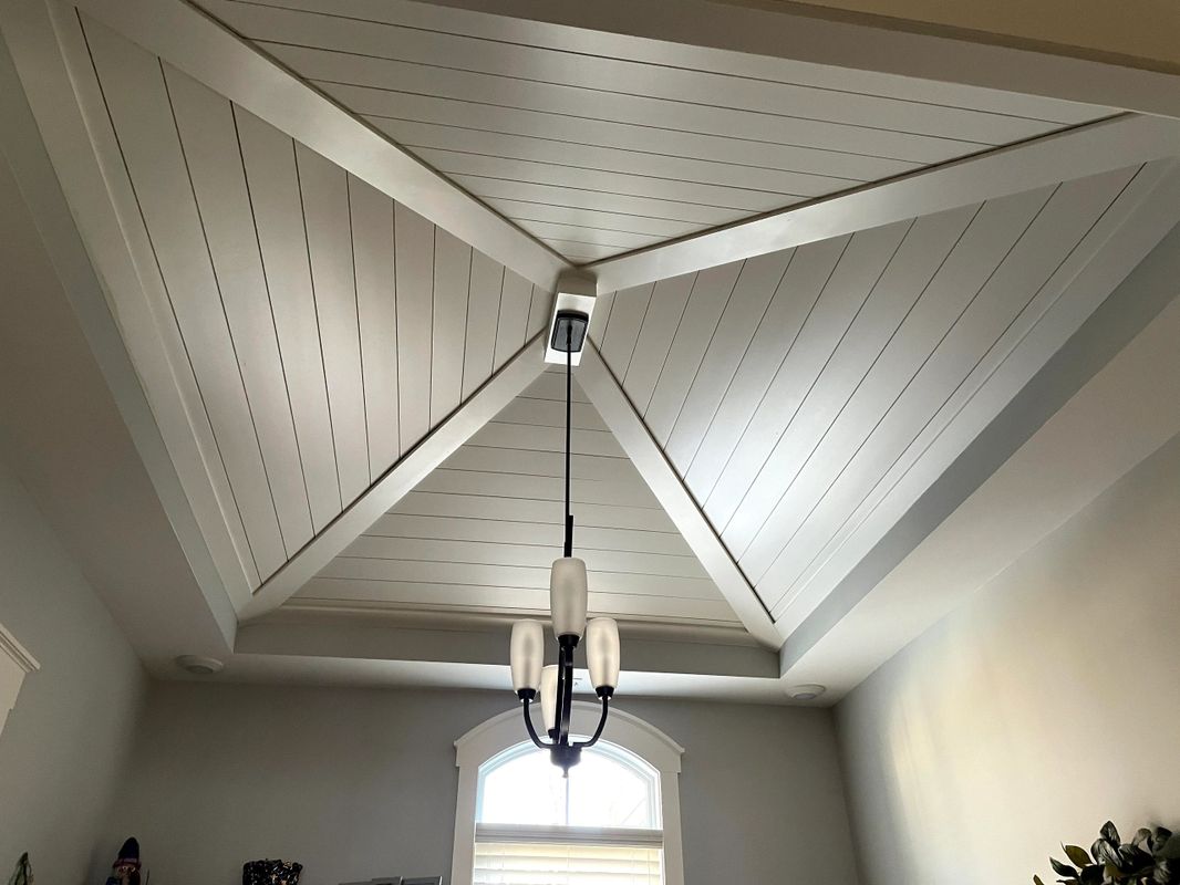 beautifully designed ceiling with hanging light