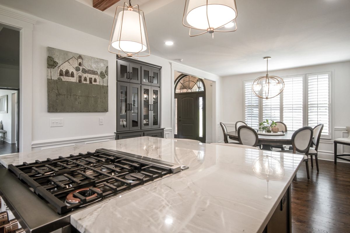 large kitchen with marble top