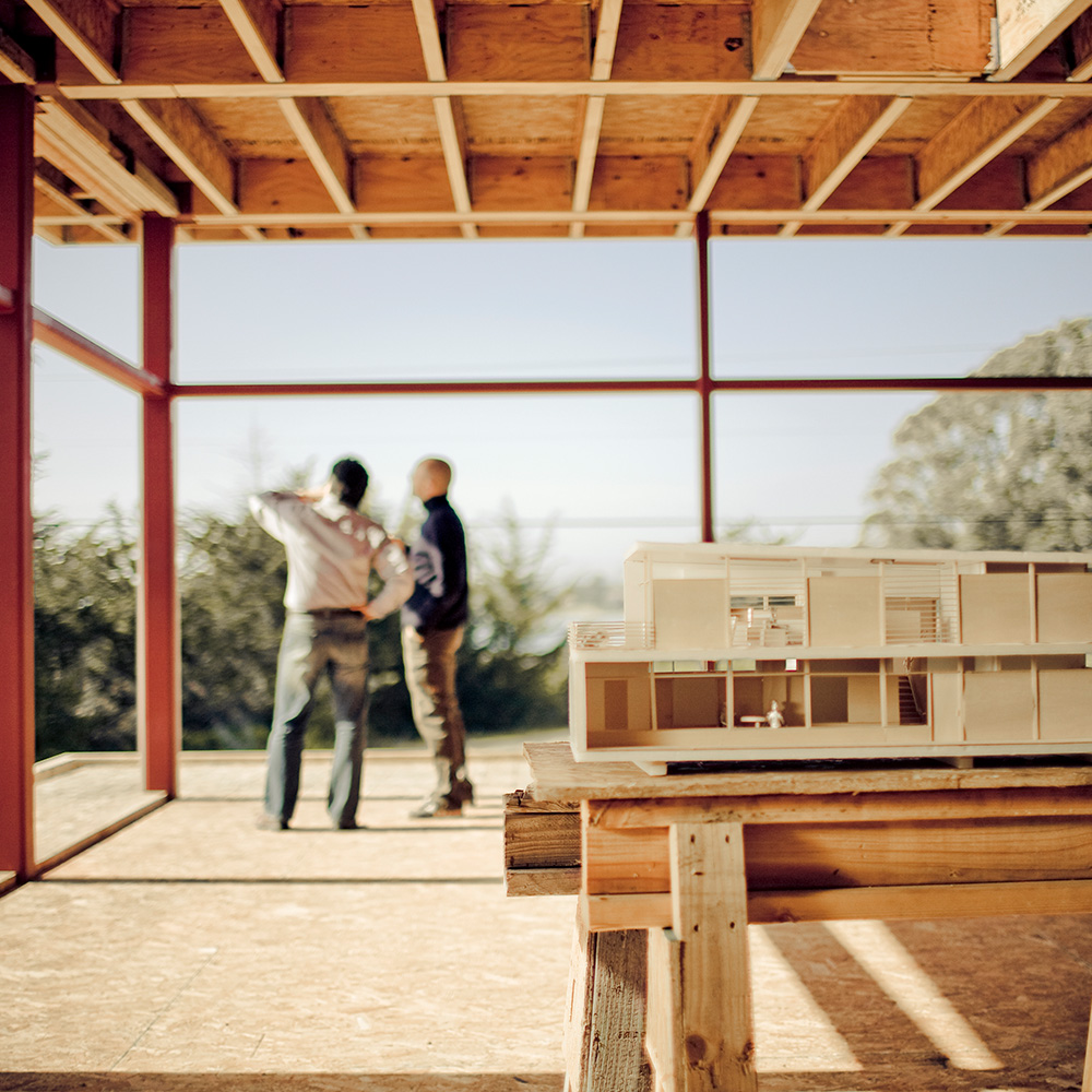 workers thinking about a project