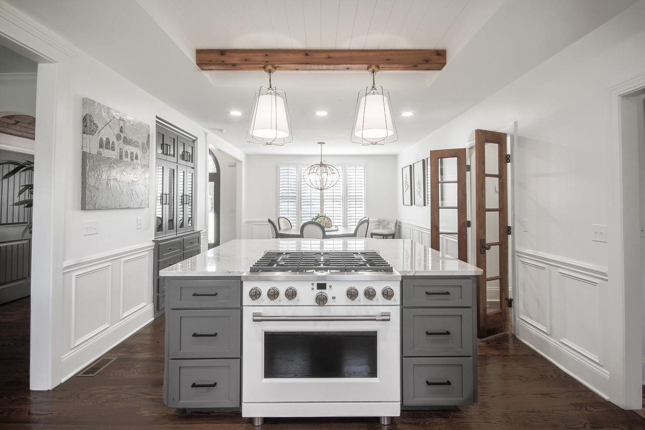 Caba Homes Gallery - white and gray kitchen with wood accents