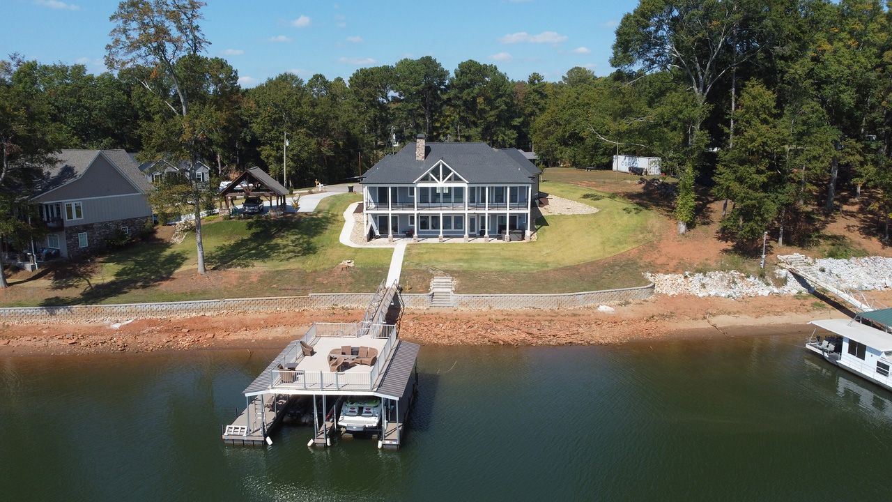 Caba Homes Gallery - aerial view of home on water