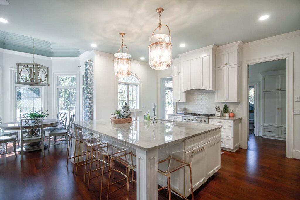 Caba Homes Gallery - beautiful white kitchen with gold accents