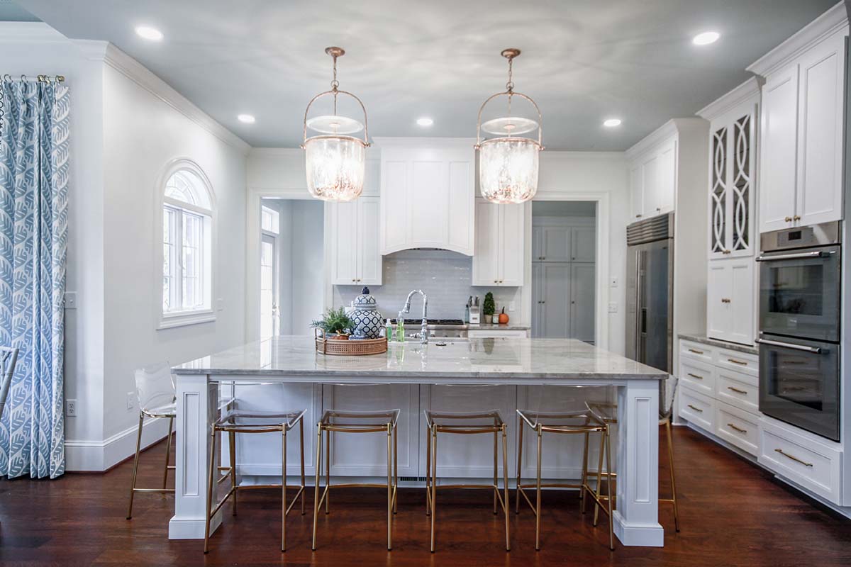 Caba Homes Gallery - beautiful white kitchen with gold accents